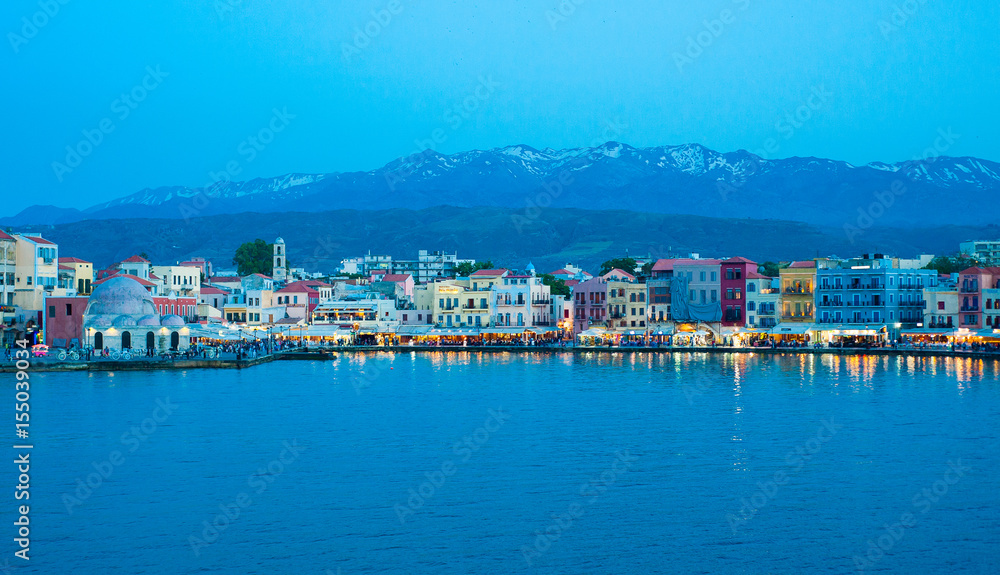 Greece, Crete, Chania (Xania) view to the port in blue hour after sunset