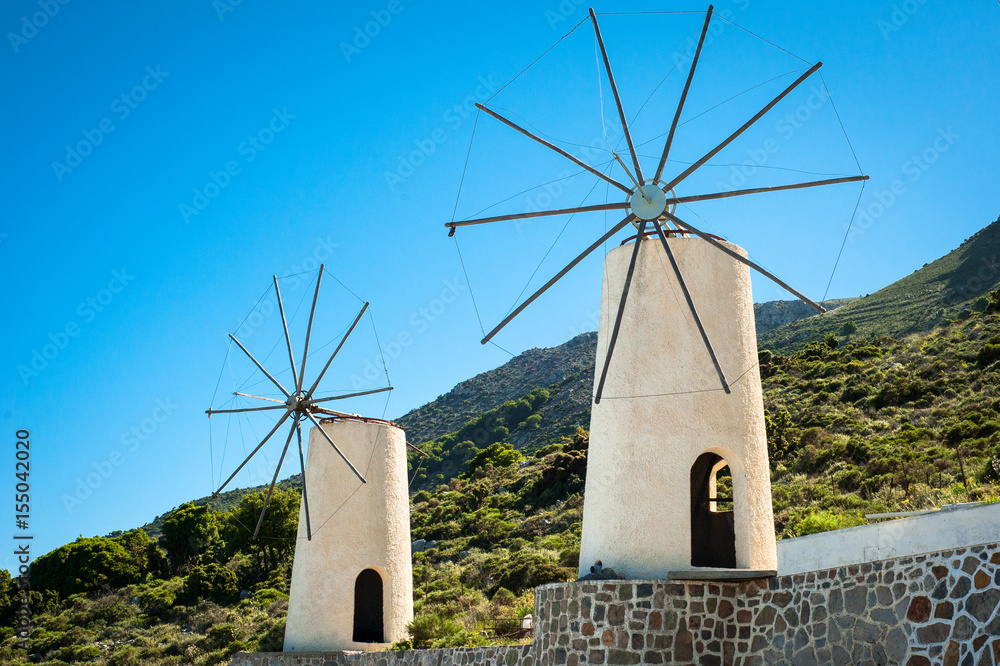Greece, Crete, Windmills on the green hill