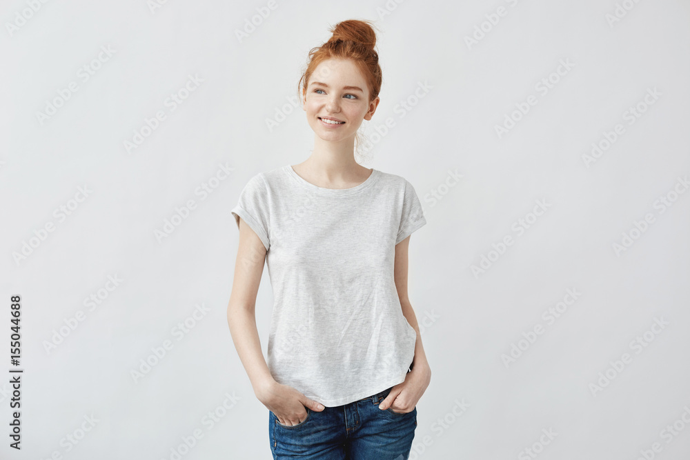 Young beautiful redhead girl smiling. Copy space. Young beautiful redhead girl smiling. Copy space.