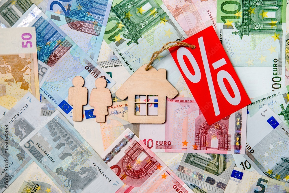 Symbol of home and family against the background of the Euro currency Symbol of home and family against the background of the Euro currency