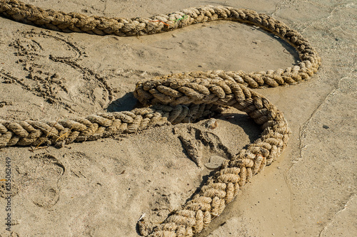 Rope on sand, Calm picture, ship line on the beach