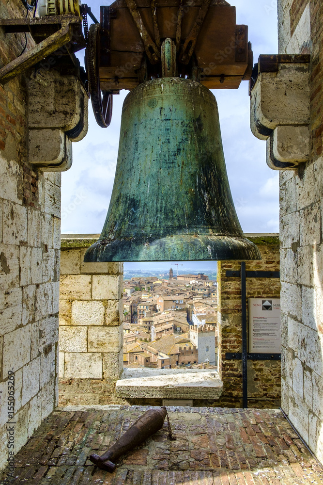 Fototapeta premium Bell at the top of Torre del Mangia in Palazzo Pubblico Siena Tuscany