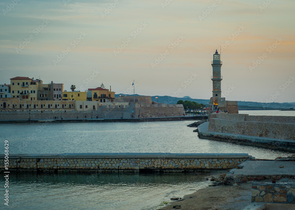 Greece, Crete, sunset in Chania (Xania) evening light to city harbour