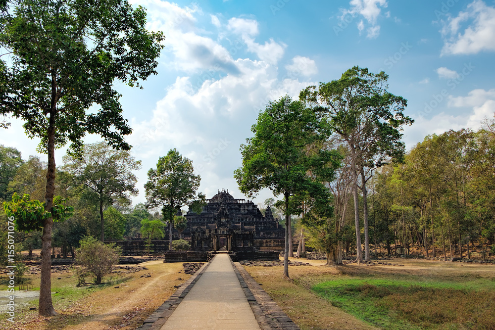 Baphuon Temple in Angkor Complex, Siem Reap, Cambodia. It is three-tiered temple mountain and dedicated to the Hindu God Shiva. Ancient Khmer architecture and famous Cambodian landmark, World Heritage