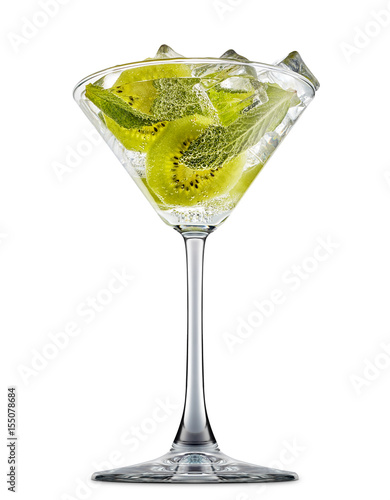 fresh fruit alcohol cocktail or mocktail in martini glass with ice cubes, kiwi and mint isolated on white background