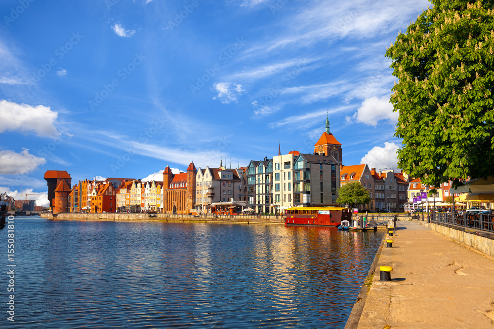 View of the riverside on Old Town by the Motlawa river in early morning light. Gdansk, Poland.