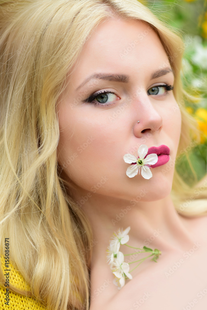 young beautiful woman portrait, girl in spring with cherry flower