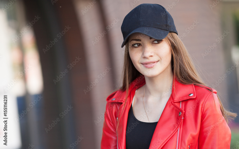Stylish woman on a city street at summer day Stylish woman on a city street at summer day