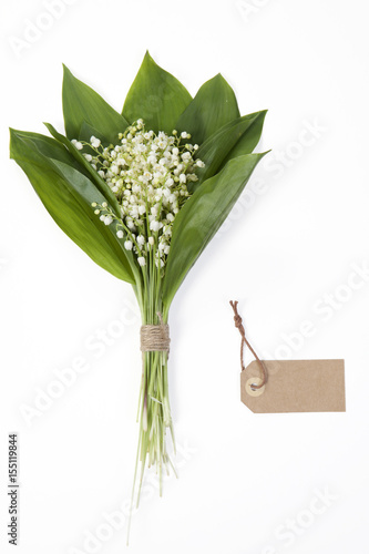 the Lilly of the valley flowers and leaves bouquet on white background