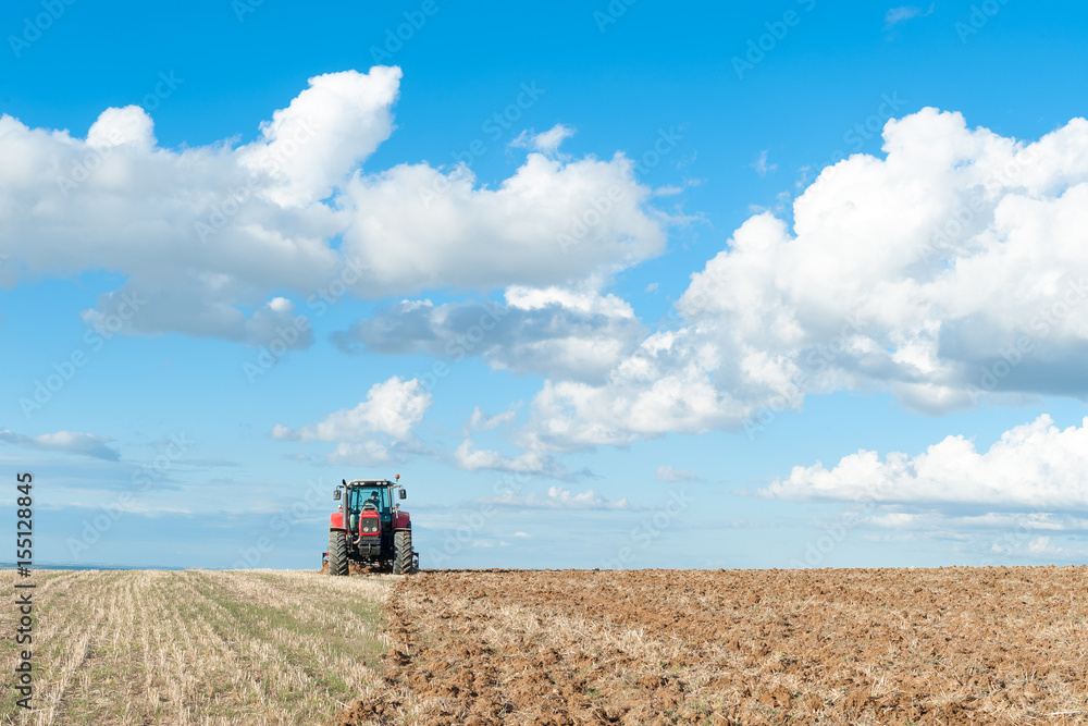 agricultural machinery working the land in the field. agricultural machinery working the land in the field.