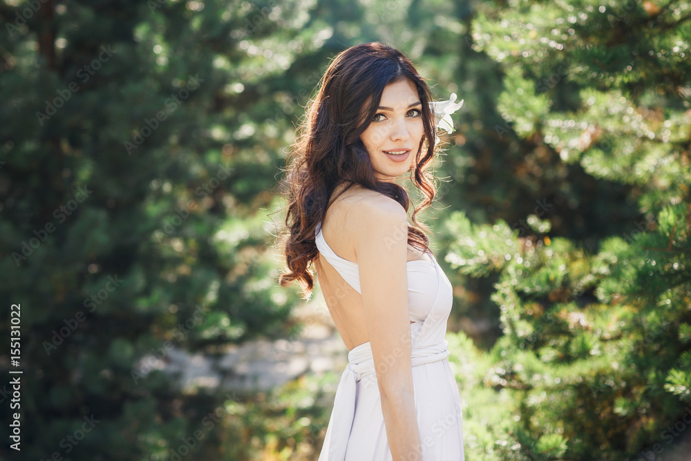 Bride looking at the camera. Wedding in the forest. Bride looking at the camera. Wedding in the forest.