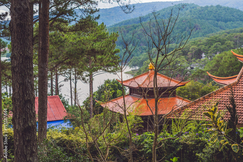 View of Buddhist temple and lake photo