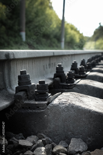 Rail anchor or joint.
