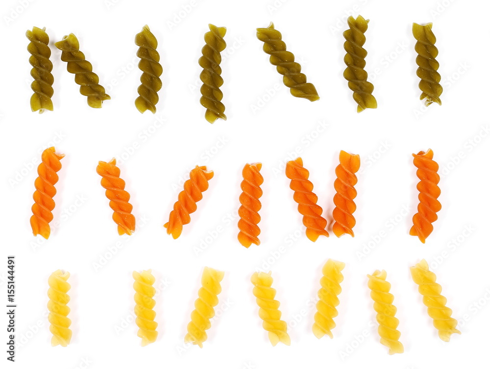 Colorful Italian spiral shaped pasta, macaroni set, isolated on white background, top view Colorful Italian spiral shaped pasta, macaroni set, isolated on white background, top view