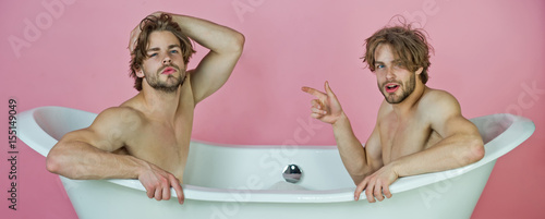 gay men or twins with muscular torso in bath, lgbt photo
