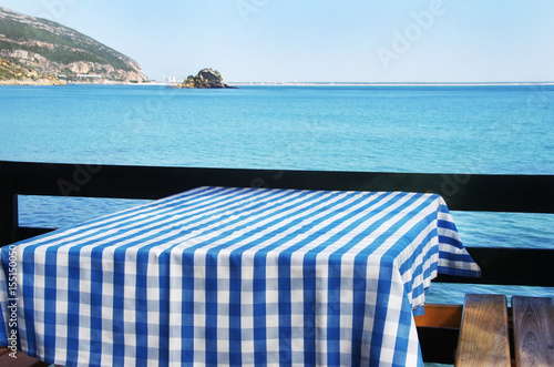 Table setting at beach restaurant, Portugal