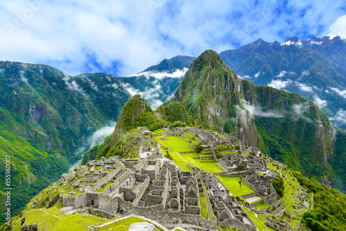 Overview of Machu Picchu, agriculture terraces and Wayna Picchu peak in the background