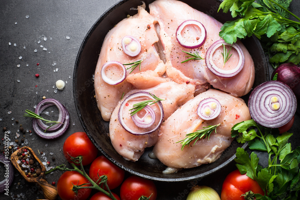 Raw chicken fillet and ingredients.Food background cooking ingredients.