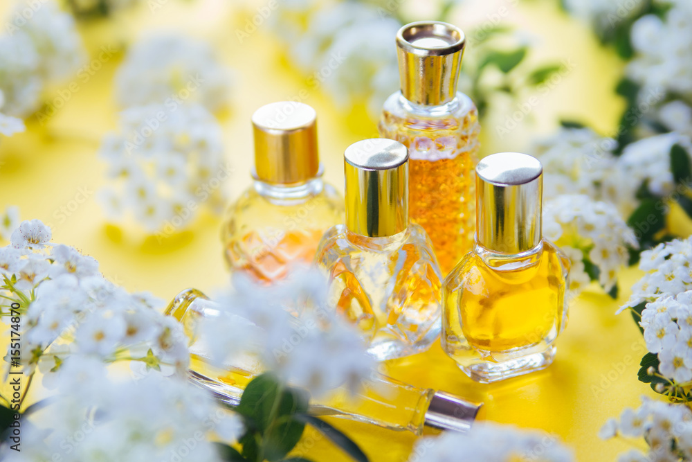 Bottles of perfume with flowers Bottles of perfume with flowers