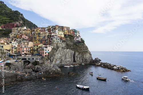 View from the sea to the harbor and the little town of Manarola  Cinque Terre  Italy