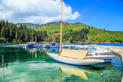 Boats in port Kouloura in Corfu, Greece photo