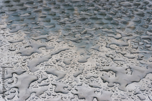 Abstract texture of liquid droplets on metal surface