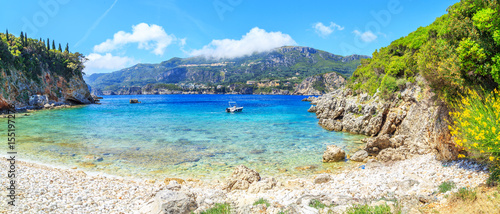 A panorama of Prto Timoni beach in Corfu, Greece
