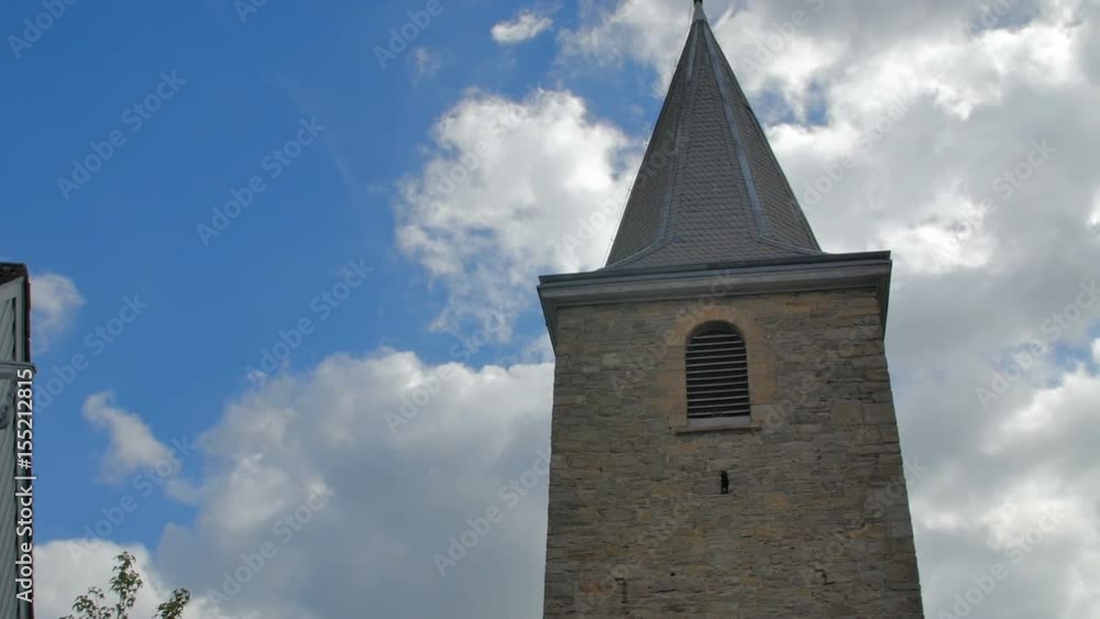 Middle Ages church tower against a clear blue sky Middle Ages church tower against a clear blue sky
