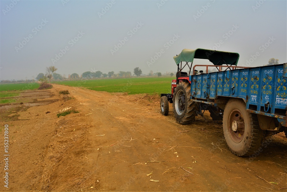 Obraz premium An Indian tractor in a farmland in North India