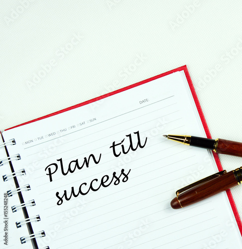 Wallpaper Mural Communication message motivation concept with "Plan till success" word on notebook. Torontodigital.ca