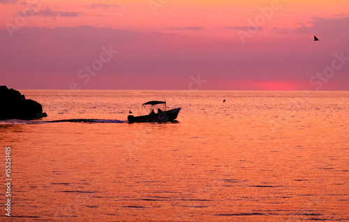  Silhouette of fishing boat in Loreto on the Sea of Cortez