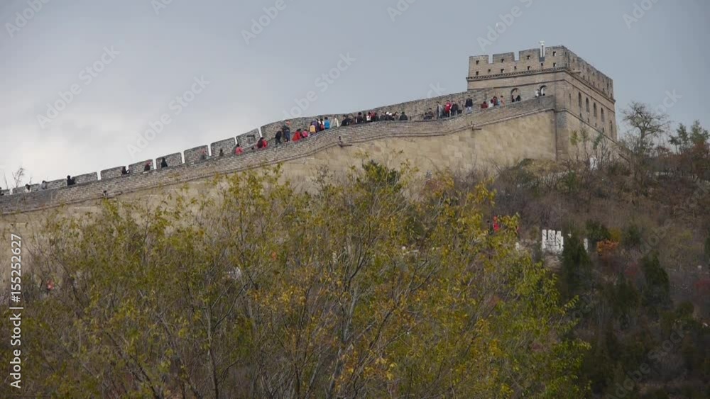 visitor climbing Great Wall on mountain peak,China ancient architecture,fortress. visitor climbing Great Wall on mountain peak,China ancient architecture,fortress.