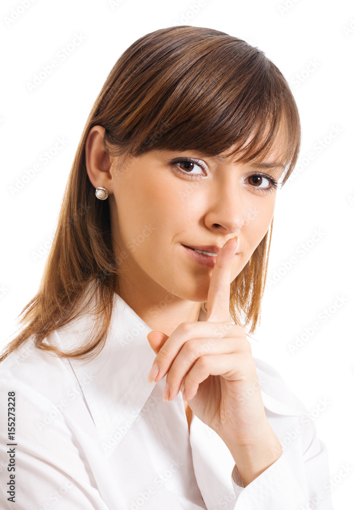 Business woman keeping finger on her lips, isolated Business woman keeping finger on her lips, isolated