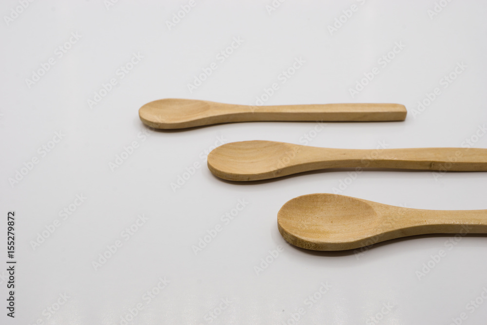Wooden spoon over white background. Wooden spoon over white background.