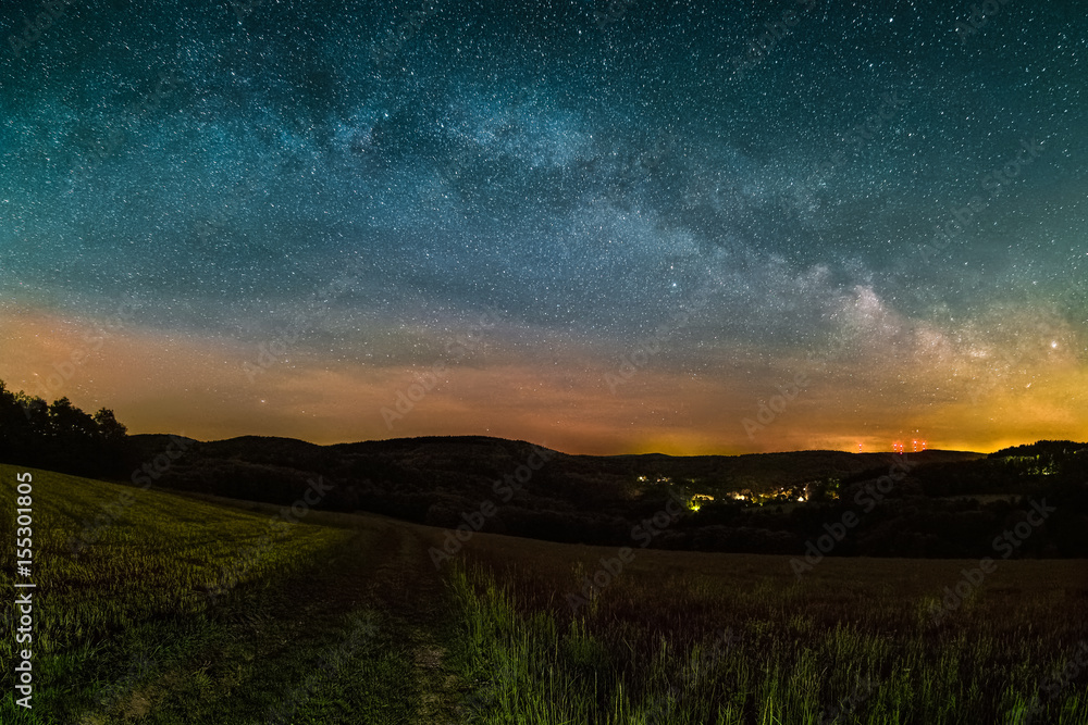 Astro Landscape with the Milky Way as seen from the Odenwald between Lampenhain and Vorderheubach (near Heiligkreuzsteinach) in Germany. Astro Landscape with the Milky Way as seen from the Odenwald between Lampenhain and Vorderheubach (near Heiligkreuzsteinach) in Germany.