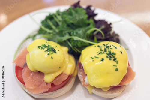 delicious eggs benedict with smoked salmon, shallow depth of field - filter effect