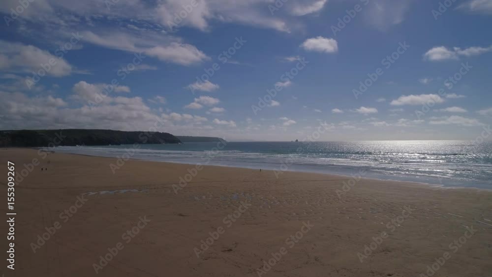 flying over a sandy beach and out into the sea, aerial seaside view of holiday destination flying over a sandy beach and out into the sea, aerial seaside view of holiday destination