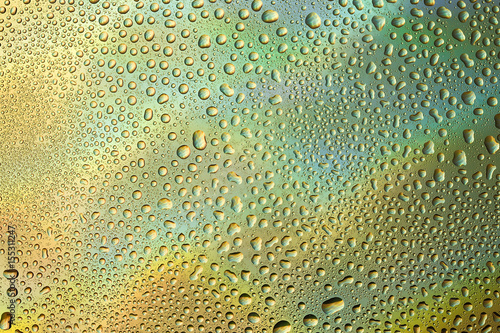 Closeup of water drops on glass surface