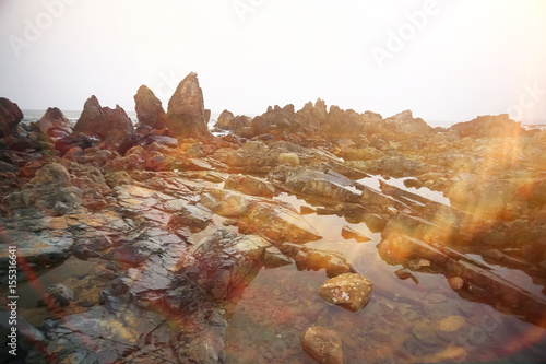 Fototapeta Naklejka Na Ścianę i Meble -  Large stones lie on the shore