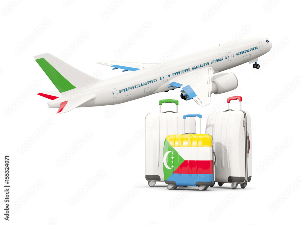 Luggage with flag of comoros. Three bags with airplane