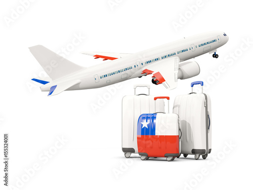 Luggage with flag of chile. Three bags with airplane