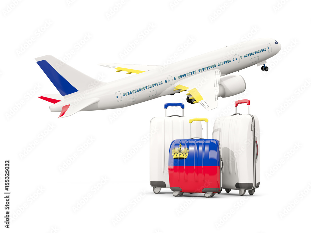 Luggage with flag of liechtenstein. Three bags with airplane
