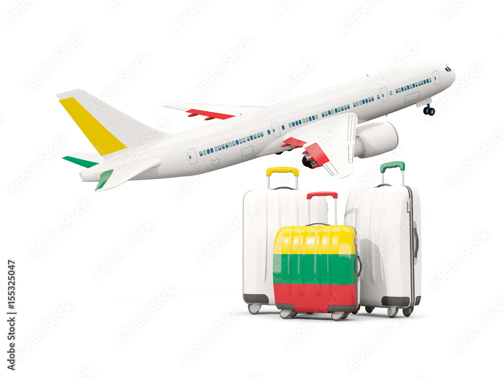 Luggage with flag of lithuania. Three bags with airplane