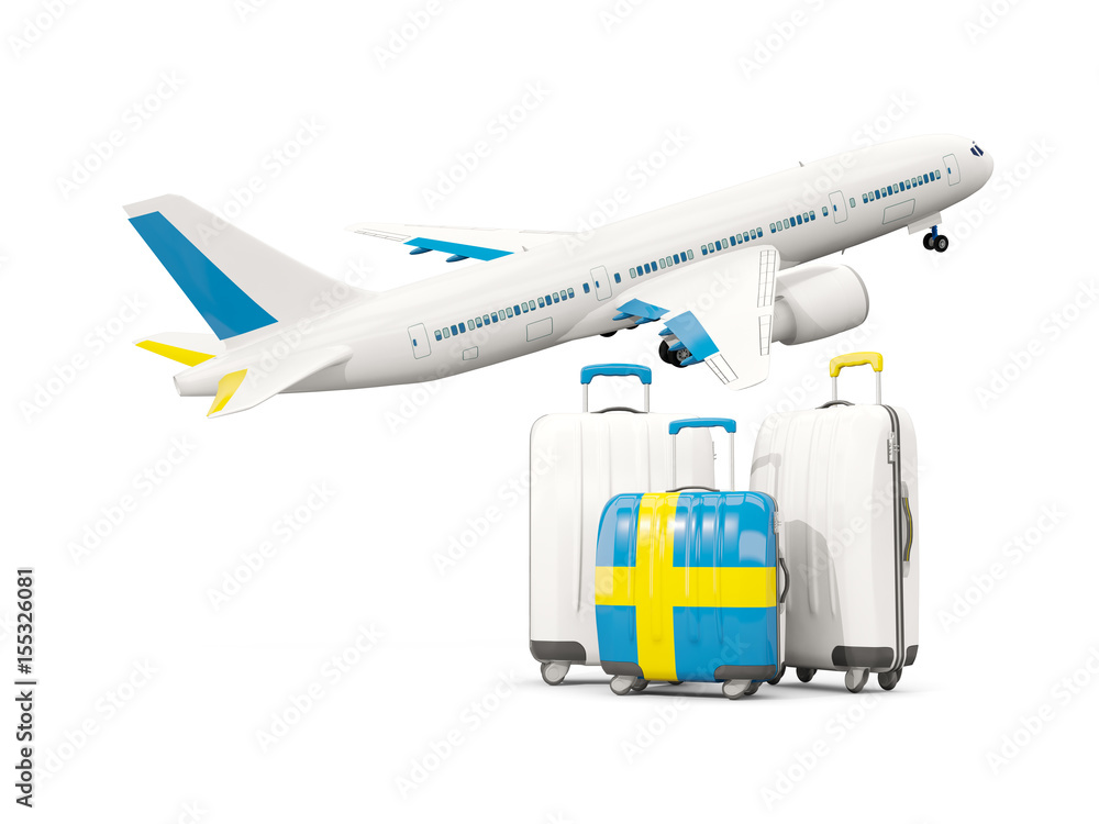 Luggage with flag of sweden. Three bags with airplane