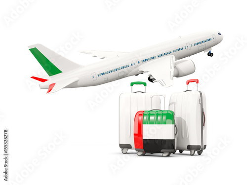 Luggage with flag of united arab emirates. Three bags with airplane © Mikhail Mishchenko