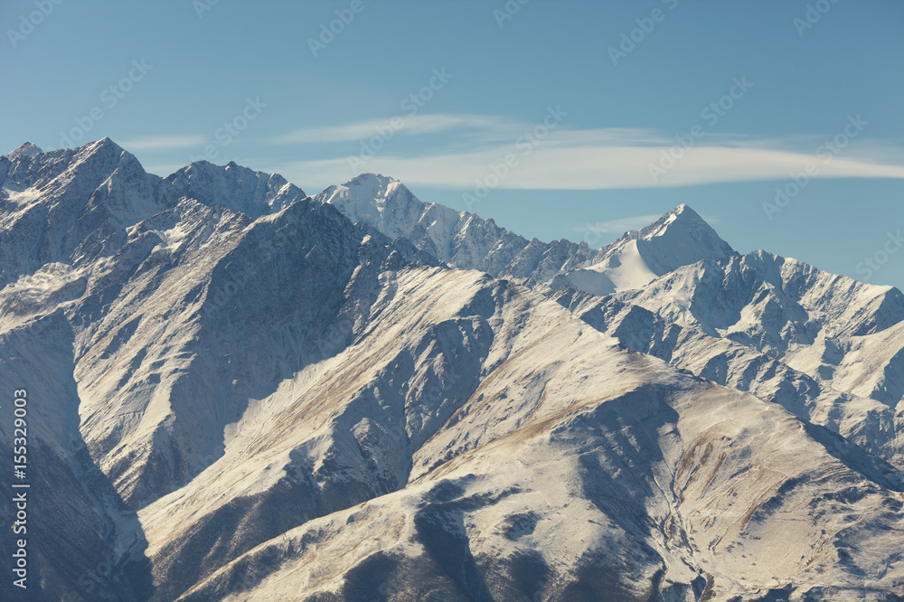 View of the snow-capped mountain peaks. The Republic of Ingushetia.