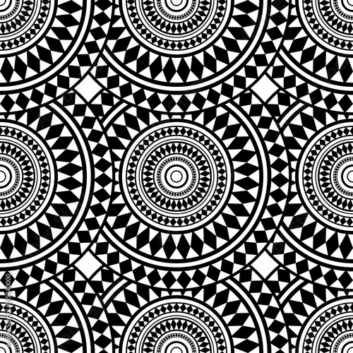 Seamless texture with black and white mandalas
