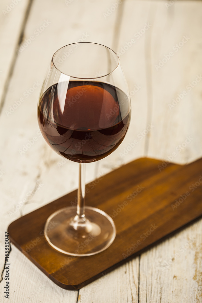 Wine glass on a wooden table