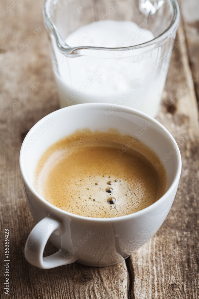 Delicious coffee cup on wooden background Delicious coffee cup on wooden background