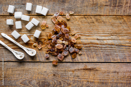 white and brown sugar for cooking sweets on kitchen wooden table top view mock-up